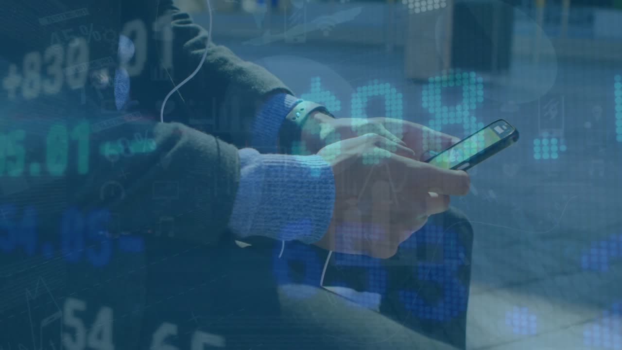 Animation of stock market over caucasian businessman using smartphone