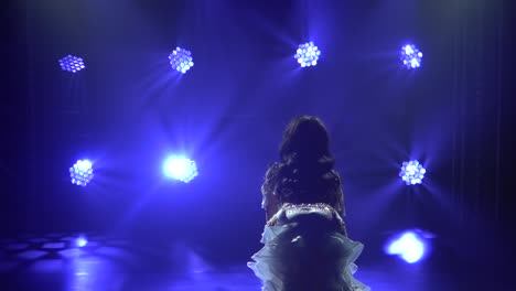 belly dancer performance under stage lights