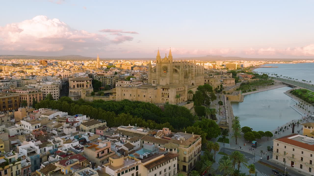 Aerial view of Palma de Mallorca Cathedral and city at sunset