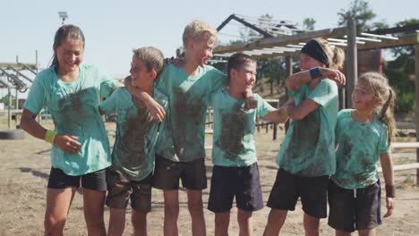 Group-of-Caucasian-boys-and-girls-at-boot-camp-together