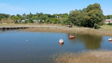 drone-view-city-scape,santa-Lucia-march-2021--drone-flying-over-the-empty-water-canoe-without-people