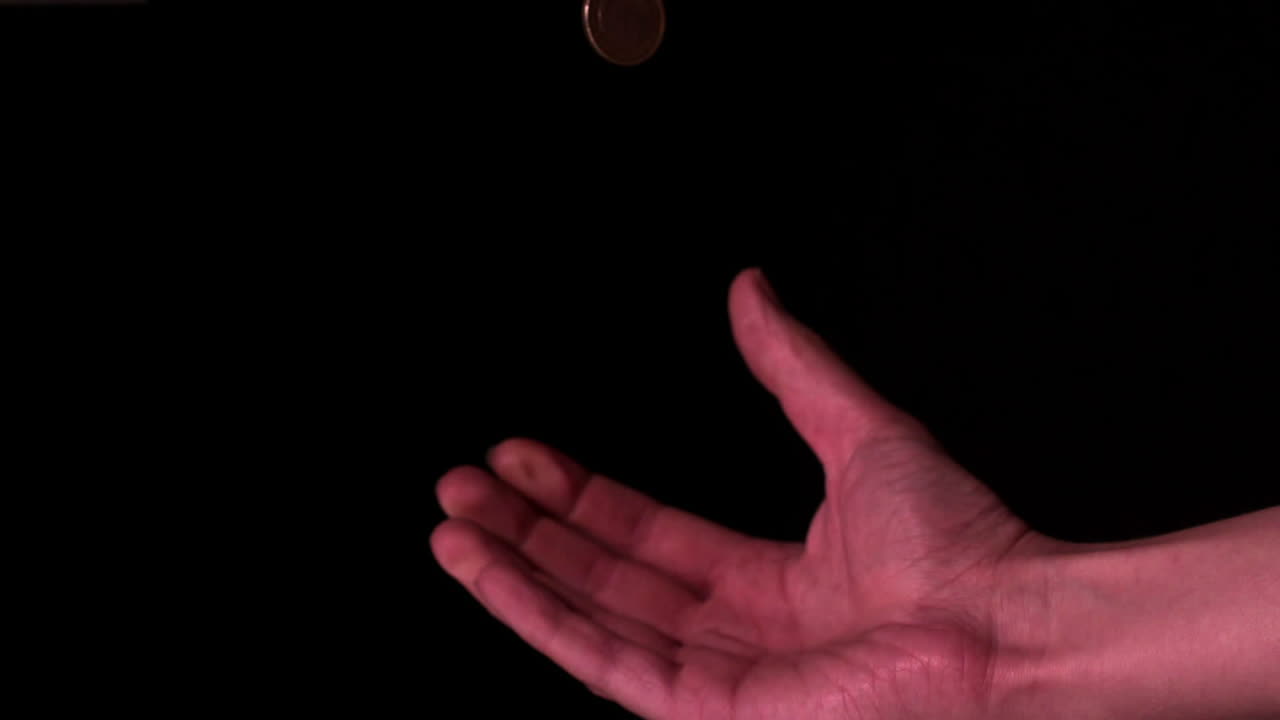 공중에 동전을 던지는 것