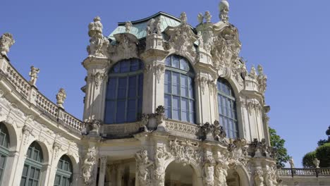 ornate baroque architecture with sculptural details under blue sky