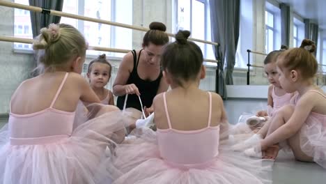 little ballerinas sitting in circle