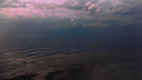 bright summer sunset after rain on the baltic sea