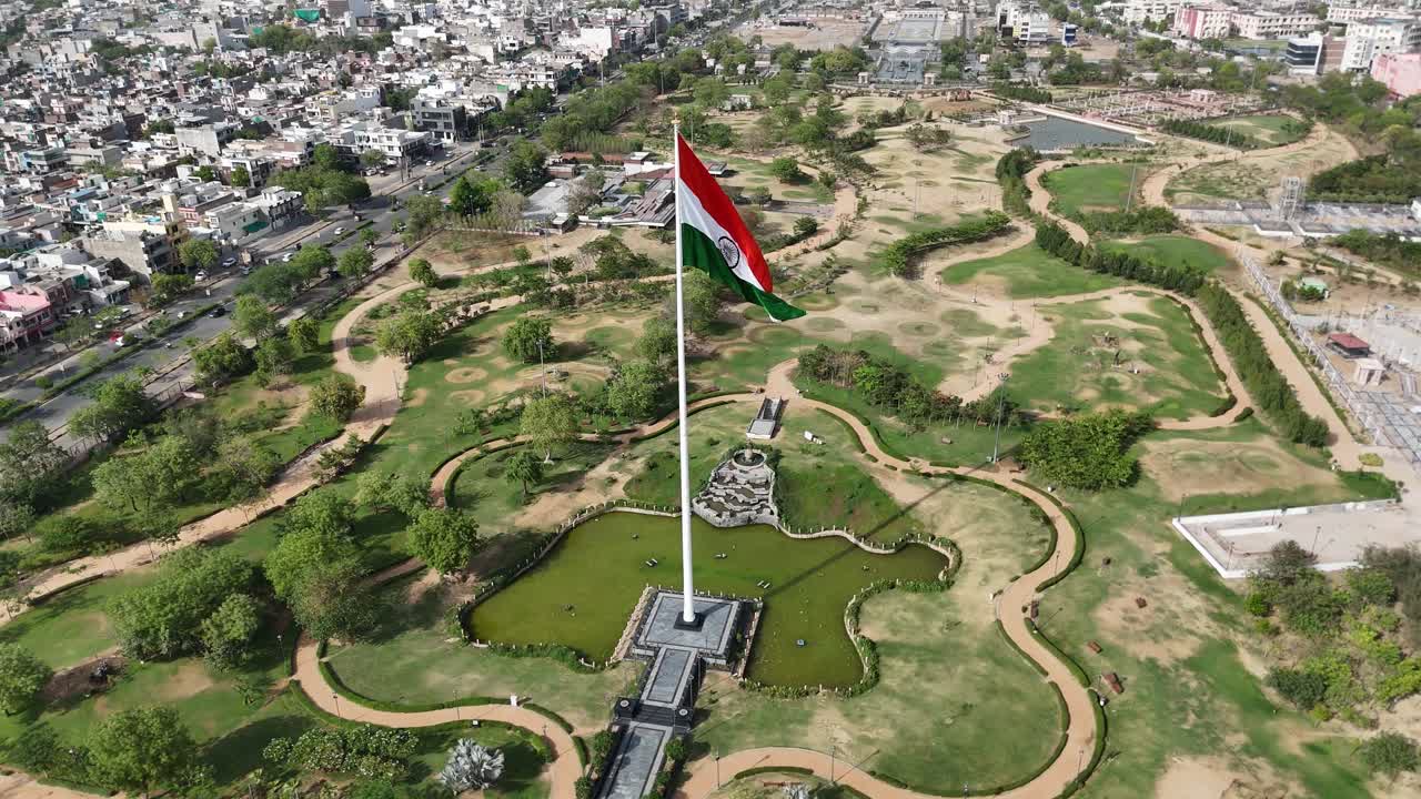 Top-down shot of Indian Flag waving near highway in Jaipur