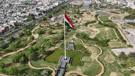 top-down shot of indian flag waving near highway in jaipur