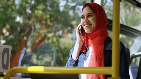 woman in hijab talking on mobile phone 4k