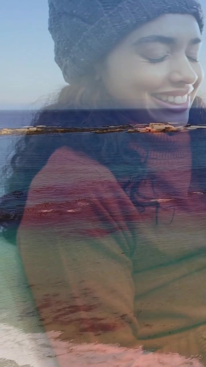 Vertical video: Sequence playing woman talking then smiling, shore seam crossing midface for design