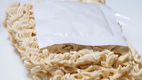 instant noodles rotate in a circle instant noodles rotate in a circle closeup of mivina noodles harmful food macaroni closeup