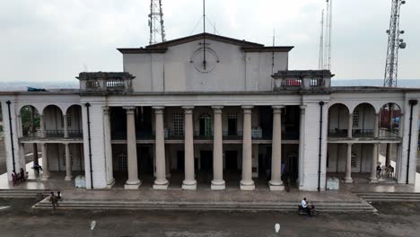 Aerial---reverse-shot-of-colonial-style-building-in-Africa