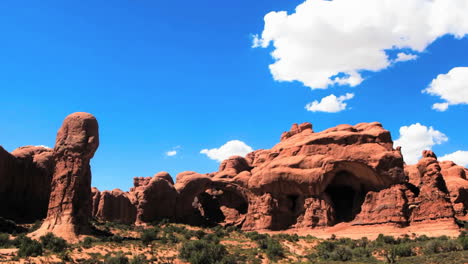 a red sandstone monument in the desert  time lapse 3