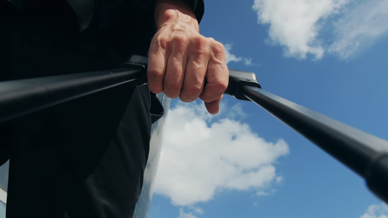 Tourist man with suitcase baggage in spain, A traveler with luggage suit jacket on business street go to a hotel, business office, airport terminal, enjoying the vibrant atmosphere