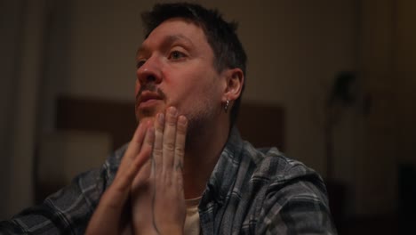 man experiencing stress or sadness