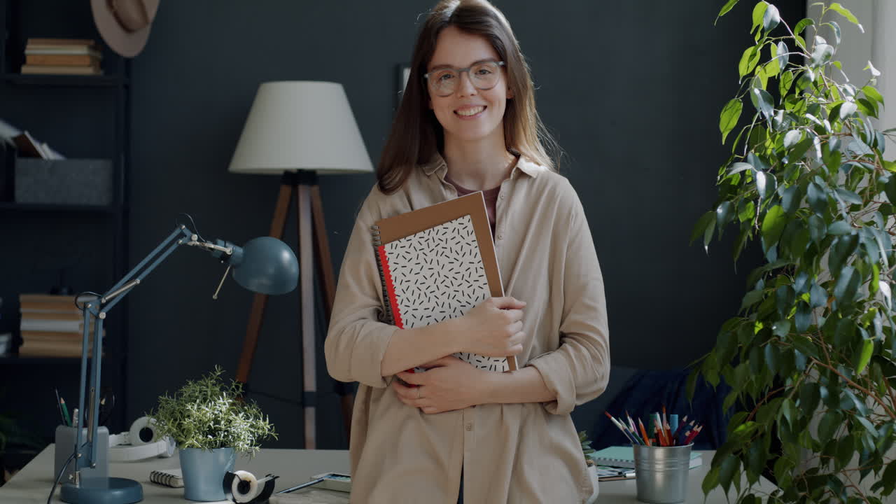 Smiling Woman Studying at Home