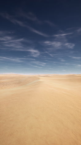 vast desert landscape with blue sky and clouds