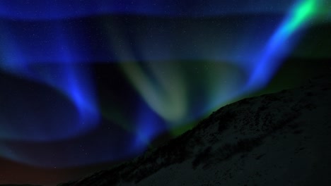 aurora with iceberg silhouette foreground