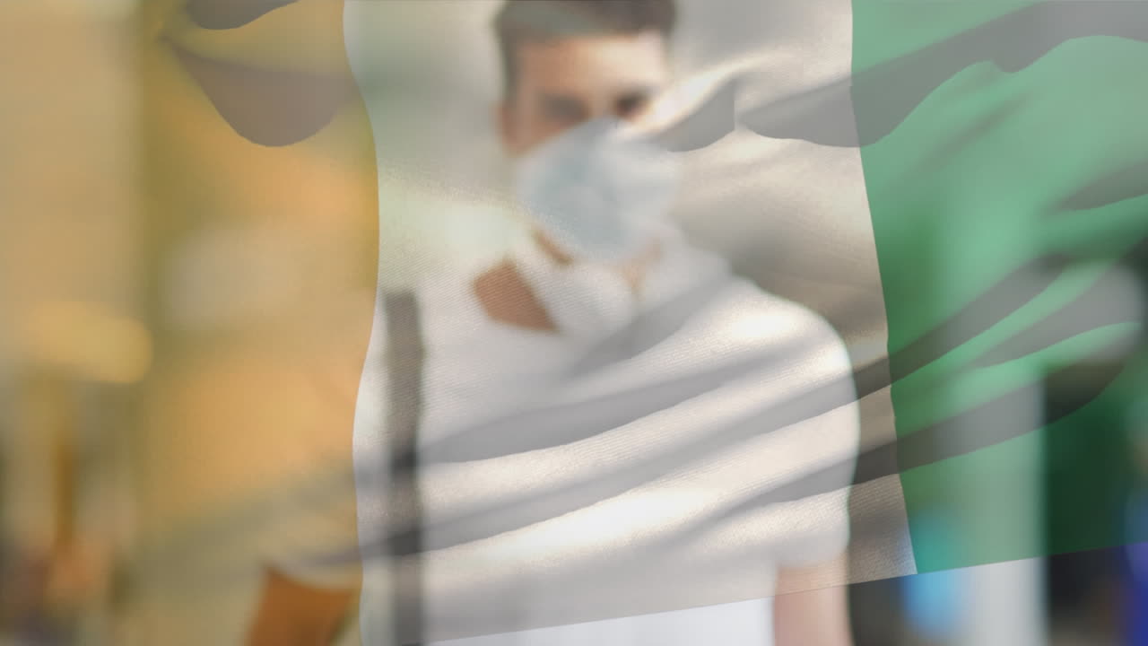 코로나19 전염병 기간 동안 마스크를 쓰고 있는 남자 위에 날아다니는 아이보리 코스트의  ⁇ 발의 애니메이션