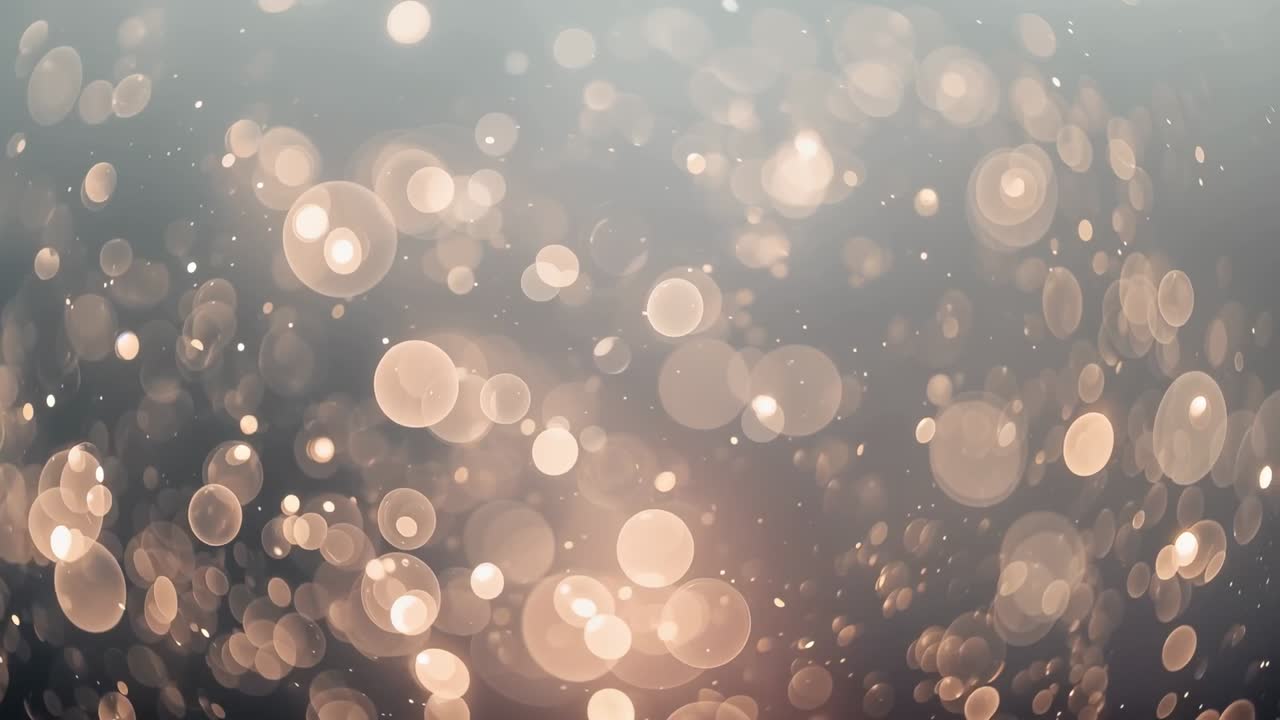 Frames starting soft light discs drifting, growing to central glow in warm gradient with speckles