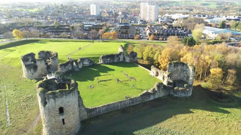 ancient flint castle medieval heritage military welsh ruins aerial view landmark tracking descent