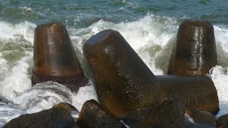 sea splashes crash the rocky stones.