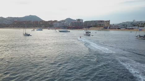 Drone-cinematic-shot-of-resort-and-buildings-in-Cabo-San-Lucas,-Mexico