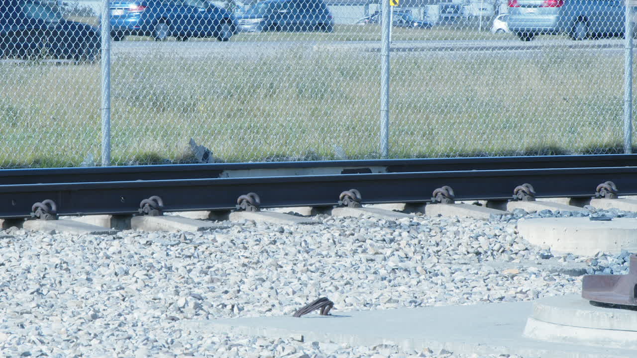 Fast Moving Train on Railroad Tracks