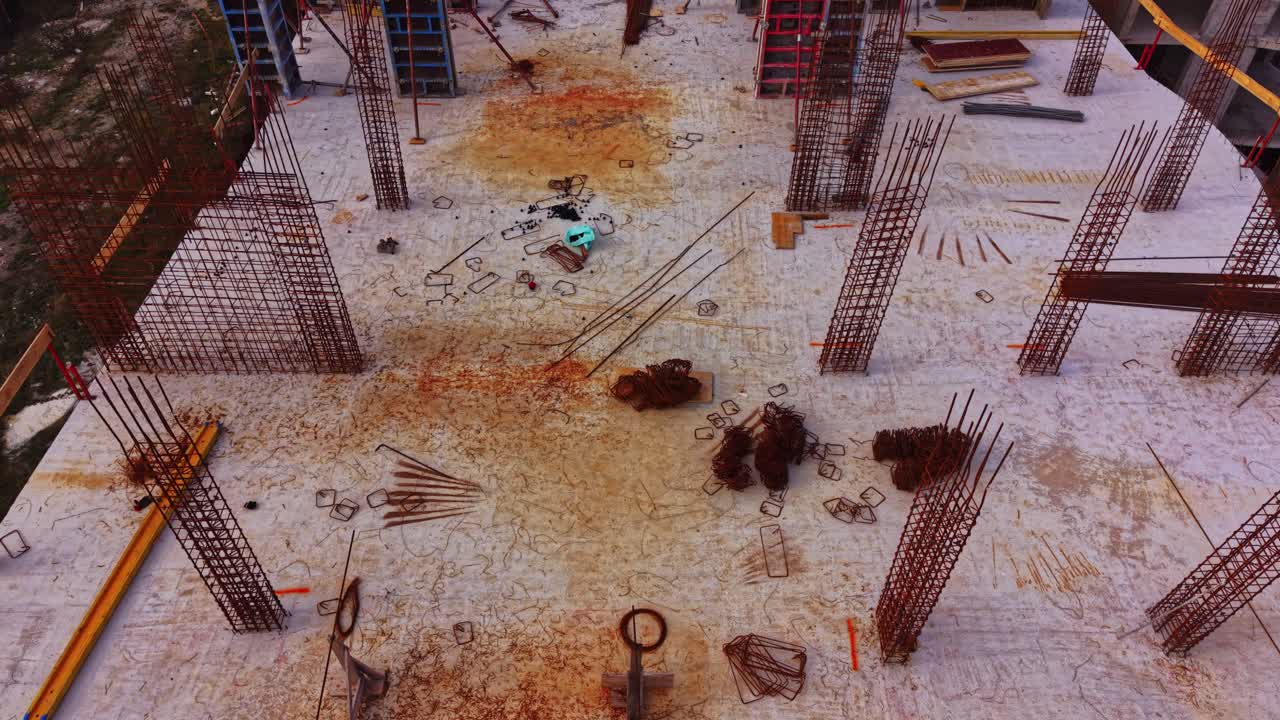 Construction site showing steel reinforcement at a new building project