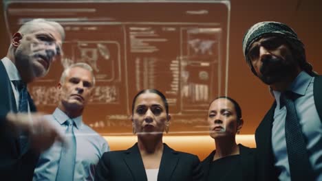 a group of focused professionals in suits gather to analyze important data displayed on a screen, showcasing their intense collaboration and commitment to decision-making