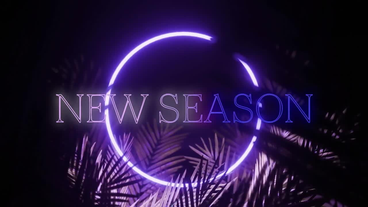 검은색 바탕에 잎이 있는 파란색 네온색의 새 시즌 텍스트와 링의 애니메이션