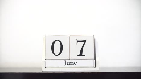 white calendar time lapse june