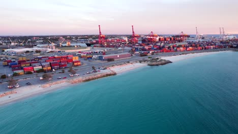 An-aerial-shot-of-Fremantle-Port-and-Port-Beach-at-sunset-in-Perth,-Western-Australia