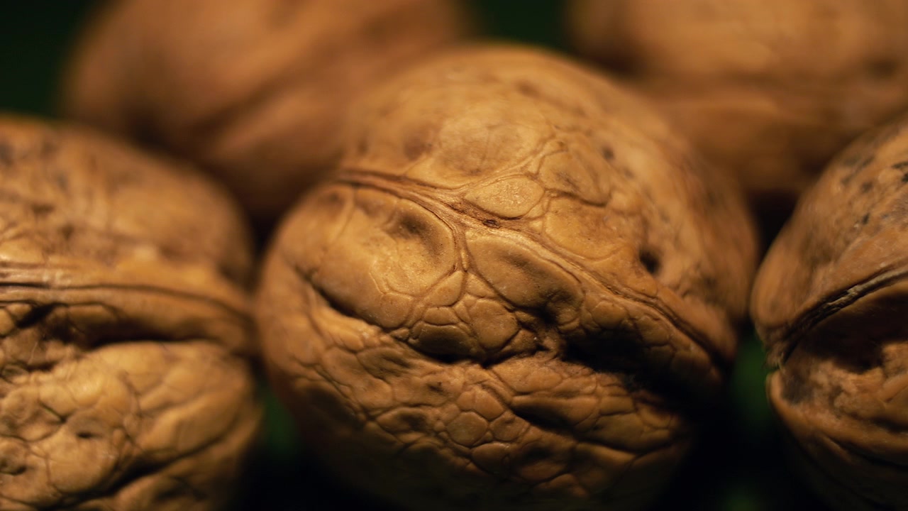 50p extreme close up slider shot moving across natural walnut texture