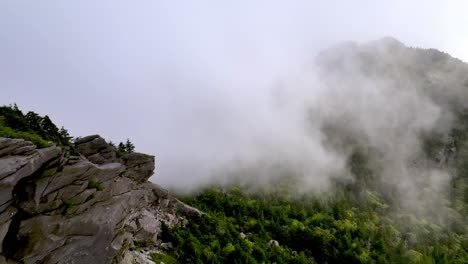 clouds move in aerial atop grandfather mountain from linville nc, north carolina