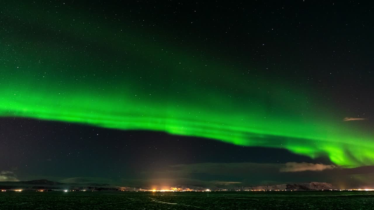 Aurora borealis high activity timelapse 4K video on clear sky winter night in Iceland