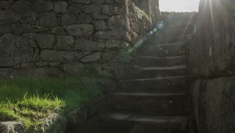 magical sun ray light sun beam in ancient machu picchu stone stairs