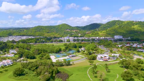 drone footage of a golf course in gurabo, puerto rico. captures lush fairways, tropical scenery, and mountain views—ideal for travel, real estate, sports, and outdoor lifestyle content