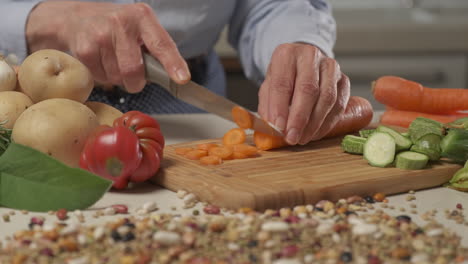 Woman-preparing-vegetables-in-modern-home-kitchen