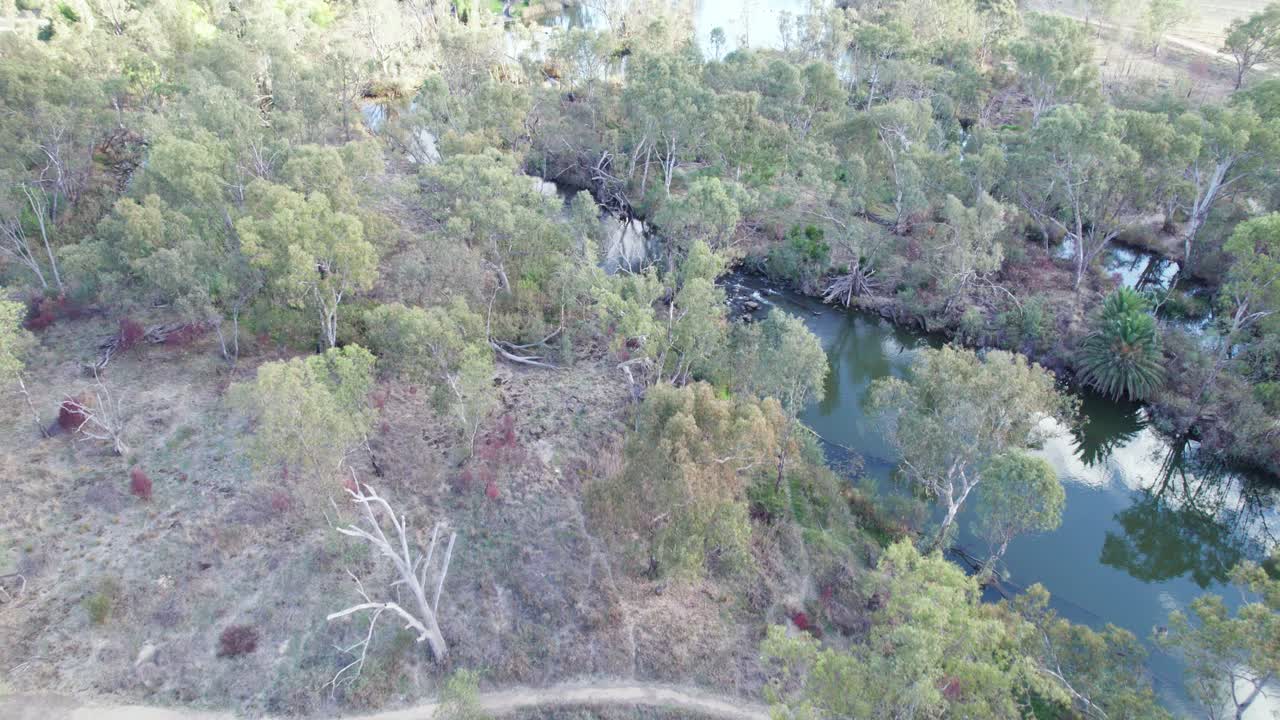 Aerial view over the Loddon River including the weir and swimming hole at Bridgewater, central Victoria, Australia, May 2025.