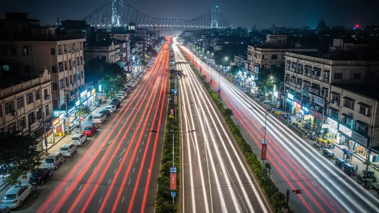 A Stunning Nighttime Cityscape Featuring Brilliant Light Trails from Vehicles on a Busy Road Underneath a Majestic Bridge, Captured in Two Frames