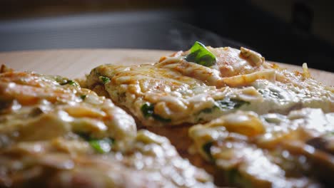 Steaming-fried-egg-with-vegetables-on-toast-close-up-on-wooden-table