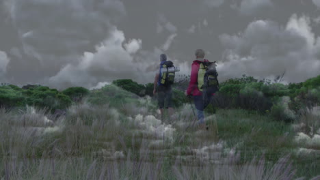couple hiking through grassland trail, with animated heart icon and health data chart
