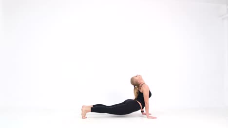 woman doing yoga breathing exercises on white background woman doing yoga breathing exercises on white background relaxed girl student doing calm yoga and improving health