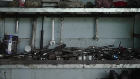 messy workshop toolshelf