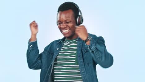 Dance,-headphones-and-excited-black-man-on-blue