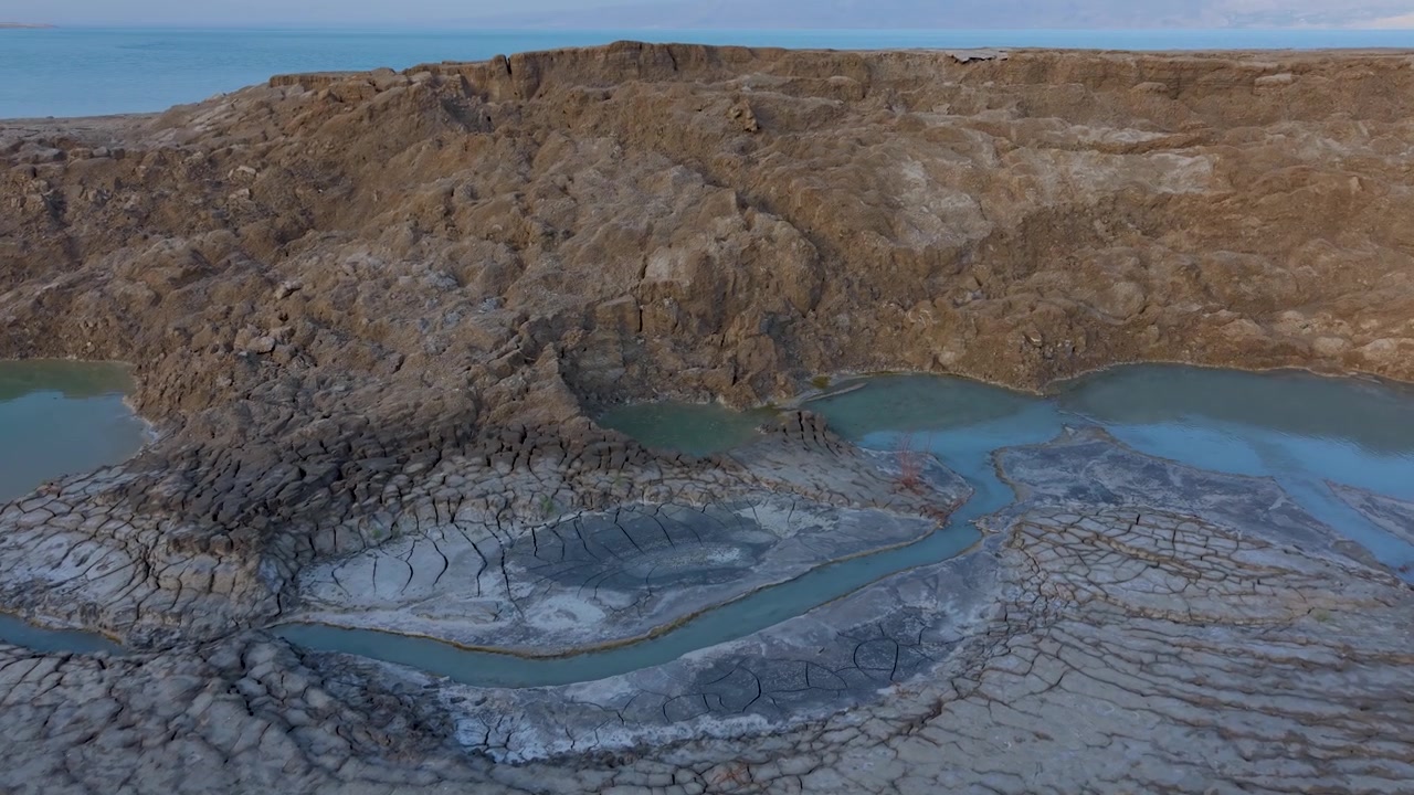 Dead Sea sinkholes, the lowest point on Earth to witness the surreal patterns of and the vastness of the surrounding desert