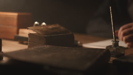old passionate man read a book in his office at night