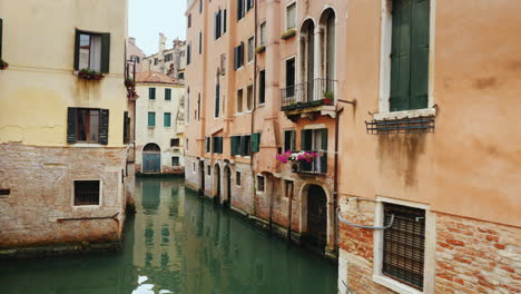 old buildings and narrow canal venice