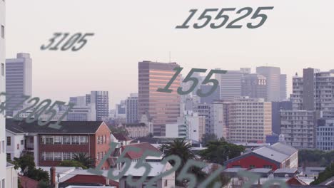 Animation-of-multiple-changing-numbers-against-aerial-view-of-cityscape