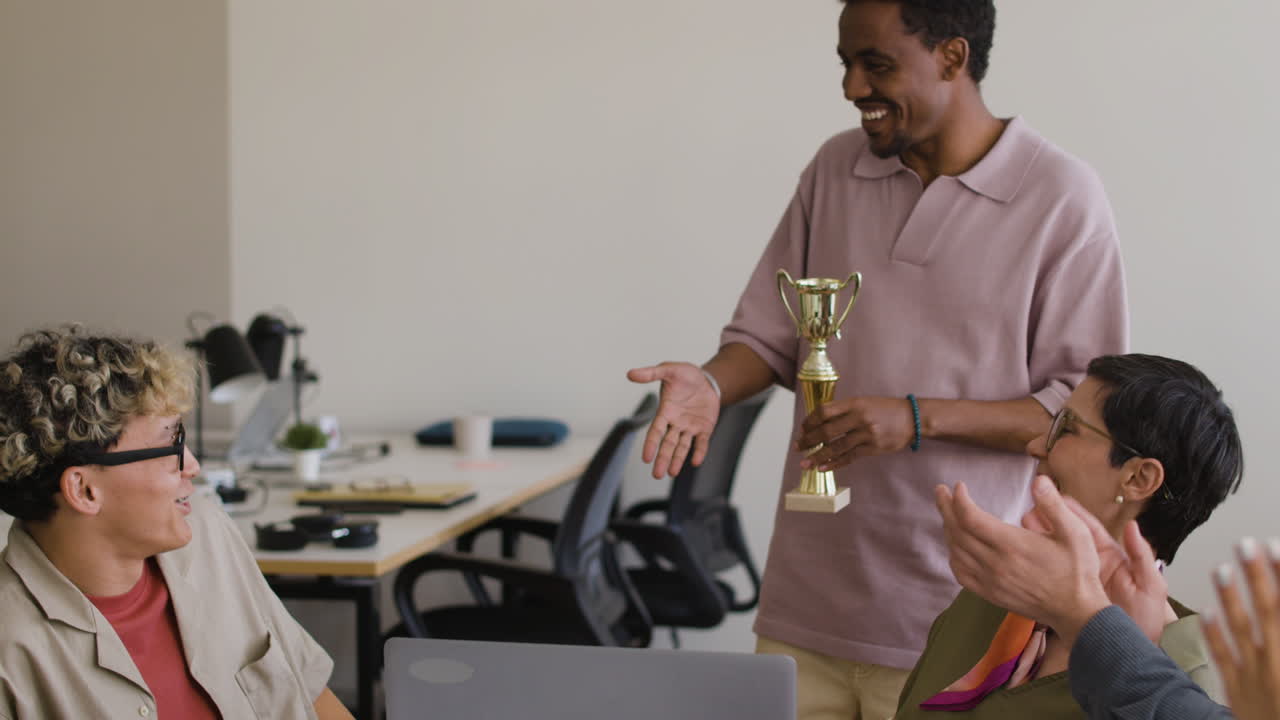 Office Award Ceremony: Colleagues Celebrate Success